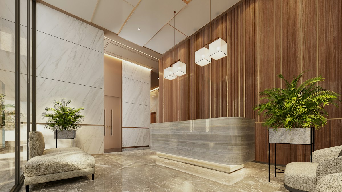 A bright office lobby with green plants